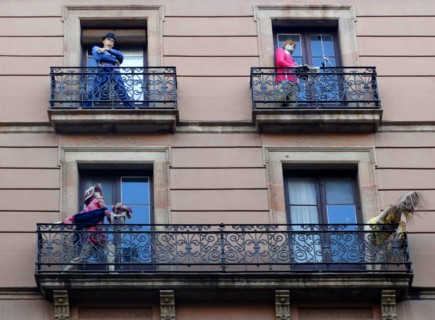 Façade of apartments with mannequins, Barcelona, Spain