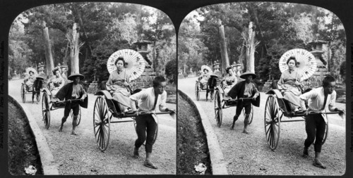 Geisha girls out for an airing in rickshaws - along the Old Avenue, Nara, Japan