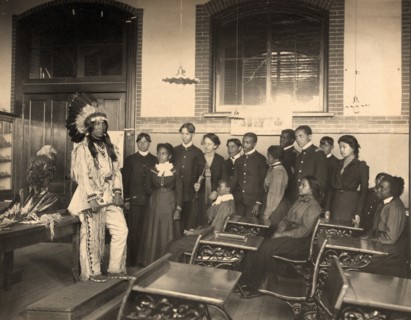 Louis Firetail (Sioux, Crow Creek), wearing tribal clothing