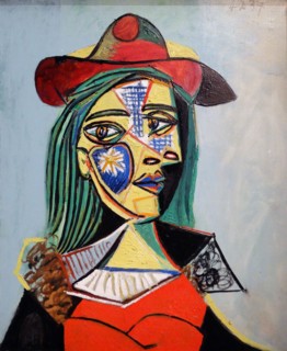 Woman in Hat and Fur collar by Pablo Picasso