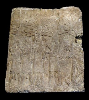 Assyrian relief depicting prisoners, guarded by Assyrian soldier about 700-692 BC From Nineveh