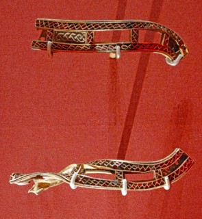 Anglo Saxon metalwork; 5th-6th Century AD. Slotted strips, with cloisonné garnets