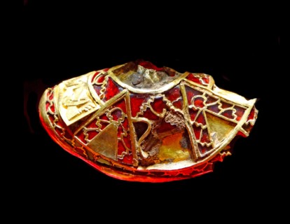 part of the boss from a shield, the lid to a Christian chalice, or the stopper to a drinking horn. Staffordshire Hoard. Anglo-Saxon.7th or 8th centuries