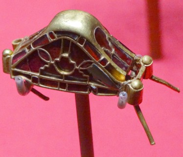 Pommel cap, decorated with cloisonné garnets. Staffordshire Hoard. Anglo-Saxon. 7th or 8th centuries