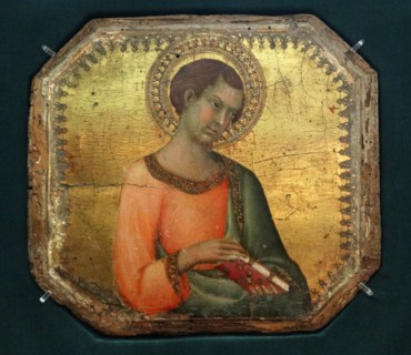A Saint holding a book by Simone Martini