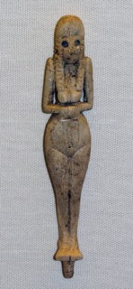 Ivory figure with hollow eyes and eyebrows from Ancient Egypt