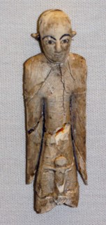 Ivory figure with hollow eyes and eyebrows from Ancient Egypt