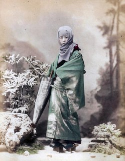 Japanese woman with umbrella, 1900
