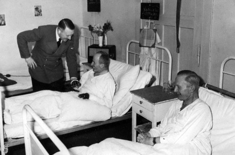 German Chancellor Adolf Hitler visits war wounded in a military hospital 1941