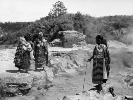 Maori cooking at boiling geo-thermal pool, Rotorua, New Zealand circa 1950