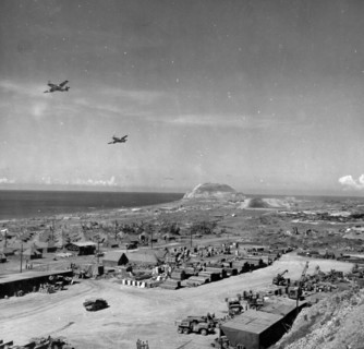 Photograph of the 21st Bomber Command P-51s Flyover in Iwo Jima Bonin Islands, Japan