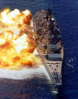 USS Iowa firing a full broadside during a gunnery demonstration, 15 Aug 1984