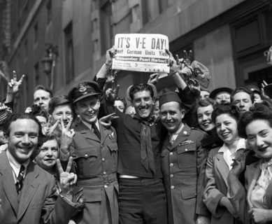 London May 1945. Crowd celebrates VE day marking the German surrender in World war two