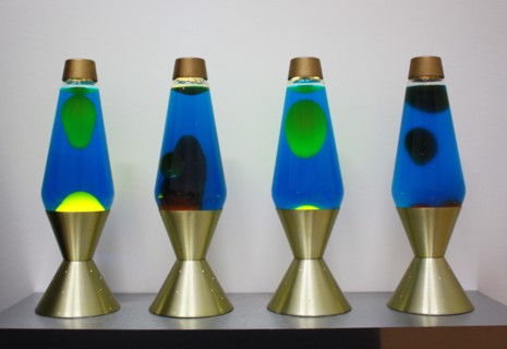 lava lamps contain blobs of coloured wax inside a glass vessel