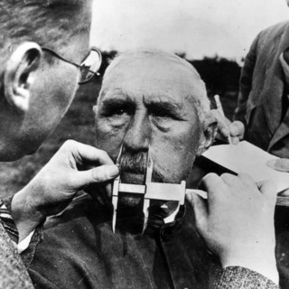 A man having his nose measured during Aryan race determination tests under Nazi Germany's Nuremberg Laws that was applied to determine whether a person was considered a 'Jew'
