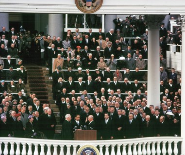 Earl Warren,swearing Dwight Eisenhower into office as President