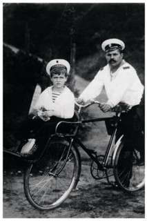 Tsarevich of Russia on a bycicle with the sailor Derevenko