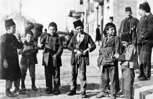 Photograph of children of different ethnic groups in a street, Ottoman Turkey