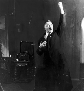 Photograph of Adolf Hitler rehearsing his speech in front of a mirror