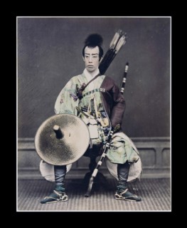Hand-coloured photograph of a Japanese archer Photographed by Felice Beato