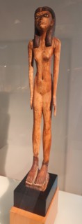 Egyptian tomb statue of a female. Wood. 11th Dynasty (2134-2040 BC).