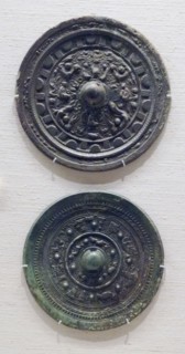 Bronze mirrors from a tomb near Miyachidake, Chikuzen, Japan