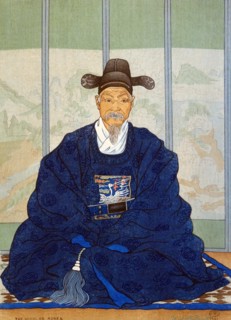Colour woodcut titled 'The Scholar' by Elizabeth Keith