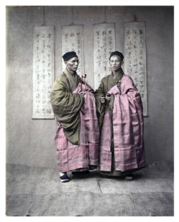 Chinese men in matching traditional dress, c, 1870s