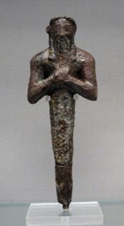 Foundation peg and Figurine from a temple