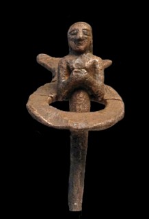 Foundation pegs and Figurine from a temple