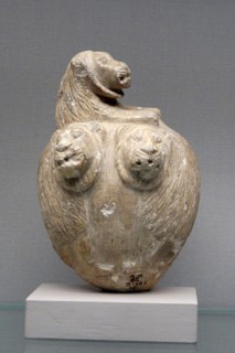 Stone mace head with lions