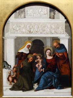 The Holy Family with Saint Francis' by Lodovico Mazzolino