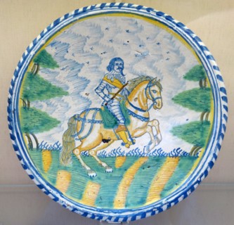 Tin-glazed earthenware dish with equestrian figure
