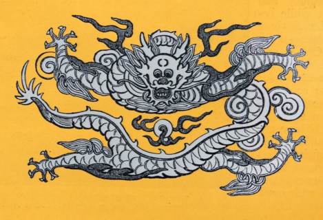 Chinese dragon emblem on a yellow background