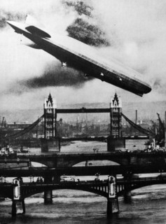 The German airship the Graff Zeppelin flies over Tower Bridge
