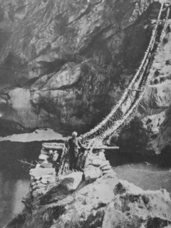 Rope bridge across a river in Kashmir India 1930