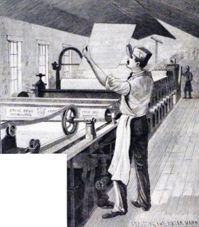 A man managing a water mark machine