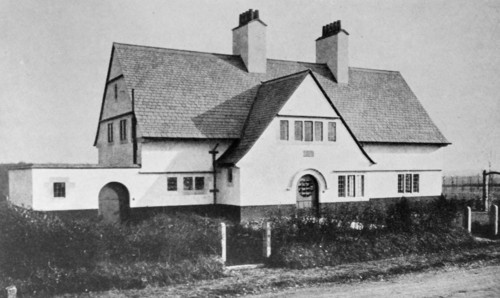 Photograph of the exterior of a Voysey House in Beaconsfield