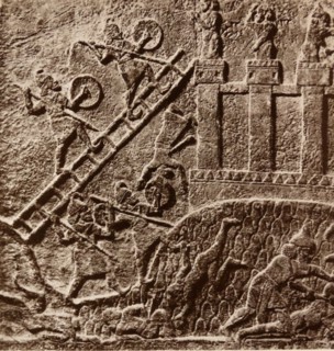 Relief of a siege depicts Assyrians attacking a fort. 1365–609 BC
