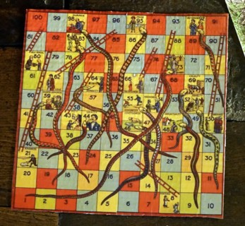 Snakes and ladders board game