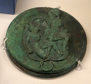 Bronze repousse relief depicting a Nike sacrificing a bull