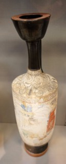 Attic vessel depicting a women offering at a tomb