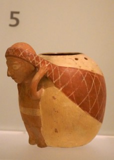 Person bearing large vessel