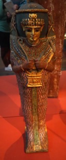 Painted and gilded mummy case for an infant
