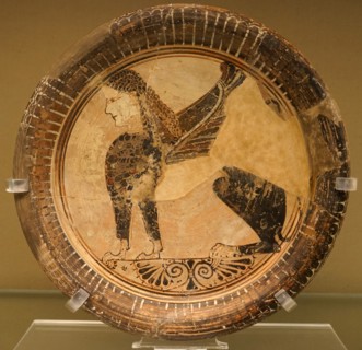 Plate with a seated sphinx