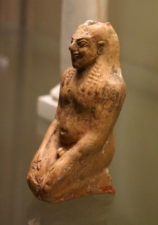 Terracotta perfume vessels in the shape of a kneeling man