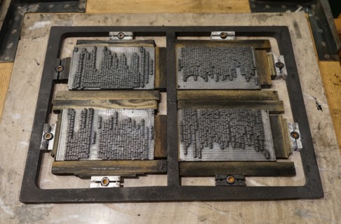 Metal plate with letters set to print