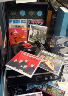 Collection of 1960's record covers and record player