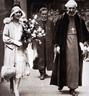 The Archbishop of Canterbury walking with Lady Elizabeth
