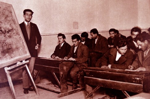 students being taught literacy in Turkey